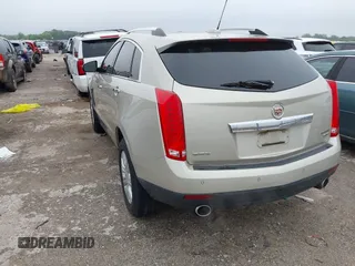 2016 Cadillac SRX Luxury Collection z VIN 3GYFNBE35GS566047, wystawiony jako IAAI lot #42201964 z przebiegiem 72 887 mil mil oraz . Historia ofert i sprzedaży dostępna na DreamBid. Obrazek 3.