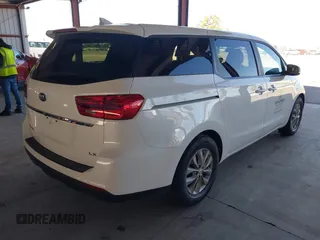 2021 Kia Sedona LX with VIN KNDMB5C15M6669588, listed as a IAAI auction lot 41757129 with 14,738 mi miles. Bid and sale history available at carsss.com. Image 4.