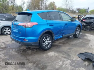 2018 Toyota RAV4 LE with VIN JTMBFREV8JJ220630, listed as a IAAI auction lot 42001795 with 86,027 mi miles. Bid and sale history available at carsss.com. Image 4.