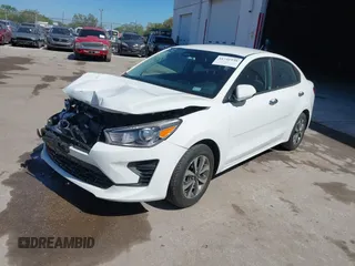 2023 Kia Rio S with VIN 3KPA24AD8PE554914, listed as a IAAI auction lot 41741938 with 24,224 mi miles. Bid and sale history available at carsss.com. Image 2.