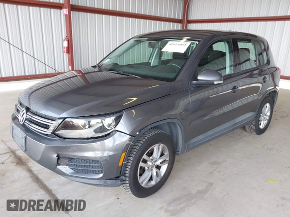 2012 Volkswagen Tiguan SEL with VIN WVGAV7AX1CW004744, listed as a IAAI auction lot 41924952 with 100,964 mi miles and . Bid and sale history available at DreamBid. Image 2.