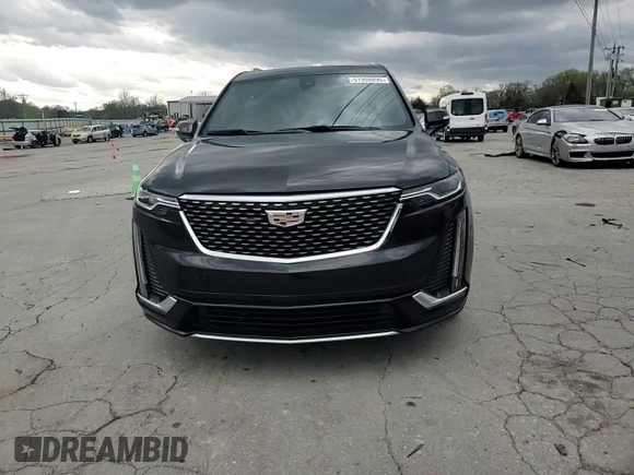 2021 Cadillac XT6 Premium Luxury z VIN 1GYKPCRS1MZ169952, wystawiony jako Copart lot #51908895 z przebiegiem 31 834 mil mil oraz Szkody całkowita. Historia ofert i sprzedaży dostępna na DreamBid. Obrazek 12.