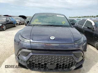 2023 Fisker Ocean One z VIN VCF1ZBU2XPG003961, wystawiony jako Copart lot #75161514 z przebiegiem 1449 mil mil oraz Nie do naprawy. Historia ofert i sprzedaży dostępna na DreamBid. Obrazek 5.