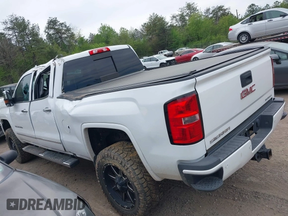 2016 GMC Sierra 2500HD Denali z VIN 1GT12UE82GF130096, wystawiony jako IAAI lot #41869448 z przebiegiem 129 659 mil mil oraz . Historia ofert i sprzedaży dostępna na DreamBid. Obrazek 14.