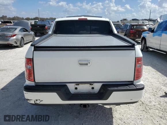 2010 Honda Ridgeline RTL with VIN 5FPYK1F51AB011041, listed as a Copart auction lot 77210844 with 81,265 mi miles and Salvage Title. Bid and sale history available at carsss.com. Image 6.