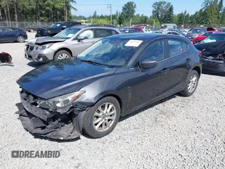 2015 Mazda 3 i Touring z VIN JM1BM1L73F1238360, wystawiony jako IAAI lot #42455285 z przebiegiem 124 319 mil mil oraz . Historia ofert i sprzedaży dostępna na DreamBid. Obrazek 2.