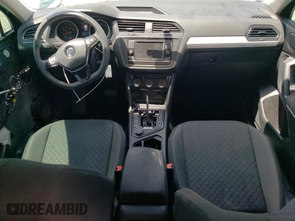2018 Volkswagen Tiguan S with VIN 3VV0B7AX4JM042248, listed as a Copart auction lot 65202625 with 102,021 mi miles and Salvage title. Bid and sale history available at DreamBid. Image 8.