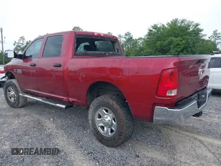 2014 Ram 2500 Tradesman z VIN 3C6UR5CL9EG187100, wystawiony jako IAAI lot #42373397 z przebiegiem 214 720 mil mil oraz . Historia ofert i sprzedaży dostępna na DreamBid. Obrazek 3.