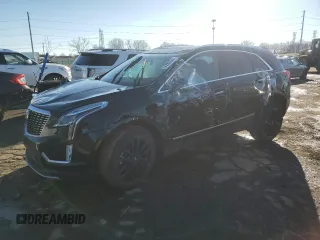 2022 Cadillac XT5 AWD Premium Luxury with VIN 1GYKNDRS7NZ164512, listed as a Copart auction lot 84883244 with 30,019 mi miles and Salvage title. Bid and sale history available at DreamBid. Image 1.
