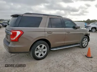 2018 Ford Expedition XLT with VIN 1FMJU1HT8JEA70326, listed as a Copart auction lot 57042785 with 123,249 mi miles and Salvage title. Bid and sale history available at DreamBid. Image 3.