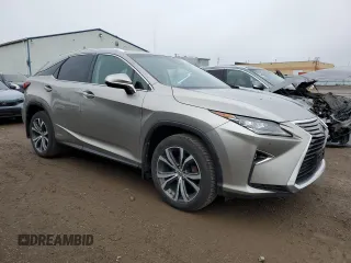2018 Lexus RX 450h with VIN 2T2BGMCA7JC023729, listed as a Copart auction lot 57952585 with 169,102 mi miles and Clean title. Bid and sale history available at DreamBid. Image 4.