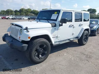 2013 Jeep Wrangler Unlimited Sahara with VIN 1C4HJWEG6DL683948, listed as a IAAI auction lot 41751628 with 112,606 mi miles. Bid and sale history available at carsss.com. Image 17.