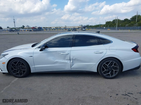 2021 Hyundai Sonata N Line with VIN 5NPEK4JC7MH125036, listed as a IAAI auction lot 41813459 with 32,131 mi miles. Bid and sale history available at carsss.com. Image 14.