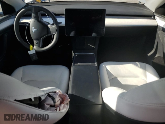 2024 Tesla Model Y Long Range with VIN 7SAYGDEE6RA261884, listed as a Copart auction lot 47639025 with 23,377 mi miles and Salvage Title. Bid and sale history available at DreamBid. Image 8.