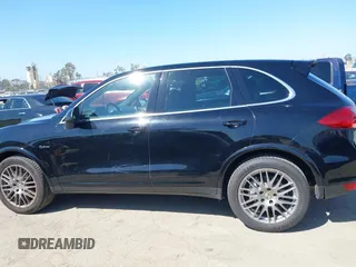 2012 Porsche Cayenne S Hybrid with VIN WP1AE2A23CLA93096, listed as a IAAI auction lot 41972843 with 79,139 mi miles. Bid and sale history available at carsss.com. Image 14.