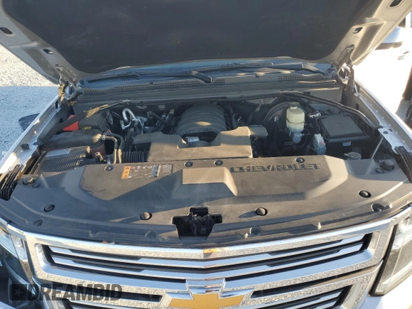 2020 Chevrolet Suburban Premier with VIN 1GNSCJKC9LR198484, listed as a Copart auction lot 87354514 with 115,008 mi miles and Salvage title. Bid and sale history available at DreamBid. Image 12.