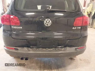 2014 Volkswagen Tiguan SE z VIN WVGAV3AX9EW614094, wystawiony jako IAAI lot #42350601 z przebiegiem 128 996 mil mil oraz . Historia ofert i sprzedaży dostępna na DreamBid. Obrazek 6.