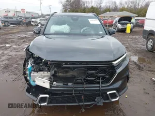 2025 Honda CR-V Sport Touring with VIN 7FARS6H93SE043232, listed as a IAAI auction lot 41679675 with 11,641 mi miles and . Bid and sale history available at DreamBid. Image 13.