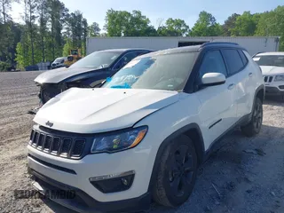 2021 Jeep Compass Altitude with VIN 3C4NJDBB2MT596181, listed as a IAAI auction lot 42026716 with 69,526 mi miles and . Bid and sale history available at DreamBid. Image 17.