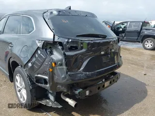 2016 Mazda CX-9 Sport with VIN JM3TCABY5G0122478, listed as a IAAI auction lot 42115795 with 134,980 mi miles and . Bid and sale history available at DreamBid. Image 6.