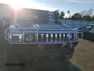 2005 Hummer H2 SUT with VIN 5GRGN22U15H101289, listed as a Copart auction lot 84107974 with 0 mi miles and Salvage Title. Bid and sale history available at carsss.com. Image 5.