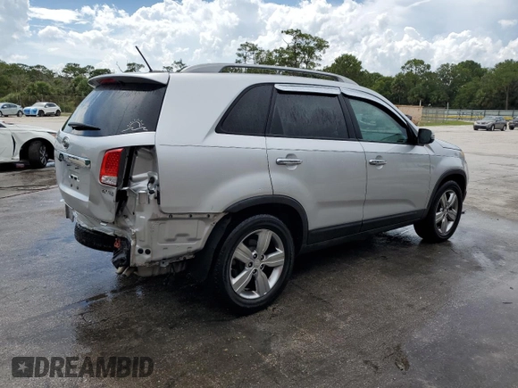 2012 Kia Sorento EX z VIN 5XYKU4A27CG229651, wystawiony jako Copart lot #60314715 z przebiegiem 117 876 mil mil oraz Szkoda całkowita • Salvage title. Historia ofert i sprzedaży dostępna na DreamBid. Obrazek 3.