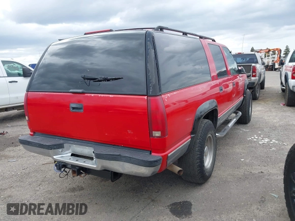 1996 Chevrolet Suburban with VIN 1GNGK26J6TJ327156, listed as a IAAI auction lot 41858544 with 195,532 mi miles. Bid and sale history available at carsss.com. Image 4.