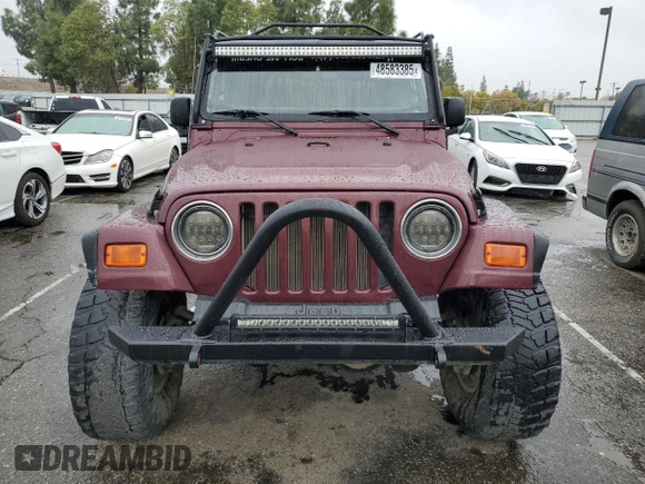 2001 Jeep Wrangler SE with VIN 1J4FA29P61P303287, listed as a Copart auction lot 48583385 with 162,447 mi miles and Salvage Title. Bid and sale history available at carsss.com. Image 5.