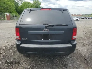 2007 Jeep Grand Cherokee Laredo z VIN 1J8GR48K47C681735, wystawiony jako Copart lot #59006435 z przebiegiem 195 517 mil mil oraz Nie do naprawy • Non repairable. Historia ofert i sprzedaży dostępna na DreamBid. Obrazek 6.