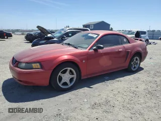 2003 Ford Mustang Standard z VIN 1FAFP40413F413973, wystawiony jako Copart lot #56566655 z przebiegiem 143 290 mil mil oraz Czysty tytuł • Clean title. Historia ofert i sprzedaży dostępna na DreamBid. Obrazek 1.
