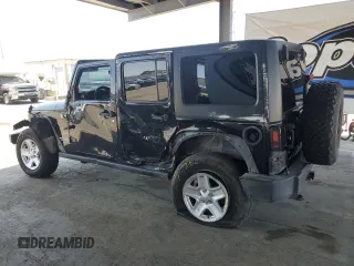 2011 Jeep Wrangler Unlimited Rubicon with VIN 1J4HA6H1XBL589103, listed as a Copart auction lot 59371155 with 156,320 mi miles and Salvage title. Bid and sale history available at DreamBid. Image 2.