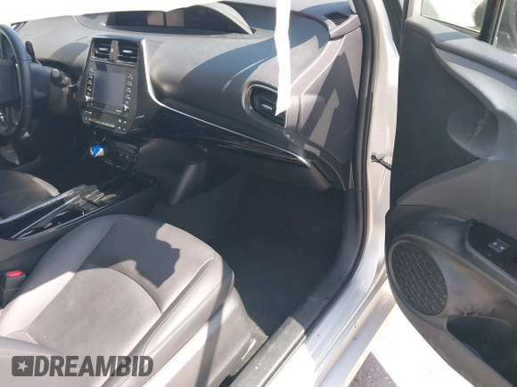 2021 Toyota Prius L Eco z VIN JTDKAMFU5M3137298, wystawiony jako IAAI lot #42270937 z przebiegiem 38 828 mil mil oraz . Historia ofert i sprzedaży dostępna na DreamBid. Obrazek 5.