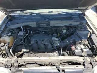 2004 Ford Escape with VIN 1FMCU02184KB21677, listed as a Copart auction lot 58401445 with 102,508 mi miles and Salvage title. Bid and sale history available at DreamBid. Image 12.