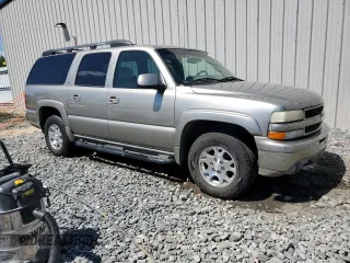 2001 Chevrolet Suburban LT with VIN 3GNFK16T71G261366, listed as a Copart auction lot 66399054 with 303,589 mi miles and Salvage Title. Bid and sale history available at carsss.com. Image 4.