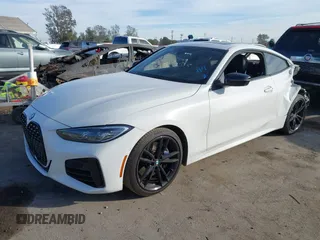 2021 BMW 4 Series M440i xDrive with VIN WBA13AR09MCF64044, listed as a IAAI auction lot 41391508 with 29,007 mi miles and . Bid and sale history available at DreamBid. Image 2.