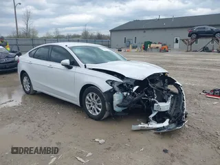 2018 Ford Fusion S z VIN 3FA6P0G73JR276334, wystawiony jako IAAI lot #41947550 z przebiegiem 64 733 mil mil oraz . Historia ofert i sprzedaży dostępna na DreamBid. Obrazek 1.