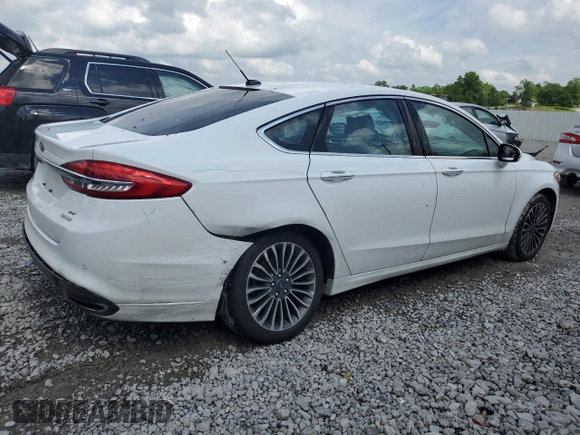 2017 Ford Fusion SE z VIN 3FA6P0H92HR203496, wystawiony jako Copart lot #56719365 z przebiegiem 99 817 mil mil oraz Szkoda całkowita • Salvage title. Historia ofert i sprzedaży dostępna na DreamBid. Obrazek 3.