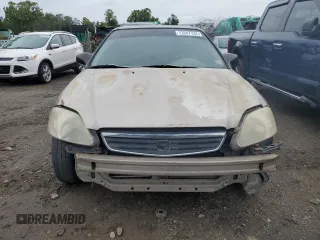 2000 Honda Civic LX with VIN 1HGEJ6675YL019892, listed as a Copart auction lot 73347734 with 400,995 mi miles and Salvage Title. Bid and sale history available at carsss.com. Image 5.