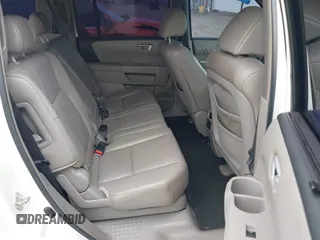 2009 Honda Pilot Touring with VIN 5FNYF48929B032510, listed as a IAAI auction lot 41945923 with 236,256 mi miles and . Bid and sale history available at carsss.com. Image 8.