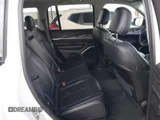 2023 Jeep Grand Cherokee with VIN 1C4RJYB60PC650900, listed as a IAAI auction lot 41773825 with 19,243 mi miles and . Bid and sale history available at DreamBid. Image 8.