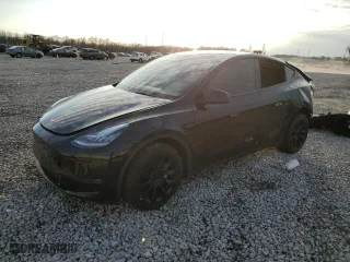 2023 Tesla Model Y Long Range with VIN 7SAYGDEE1PA057961, listed as a Copart auction lot 86197254 with 24,835 mi miles and Salvage Title. Bid and sale history available at carsss.com. Image 1.