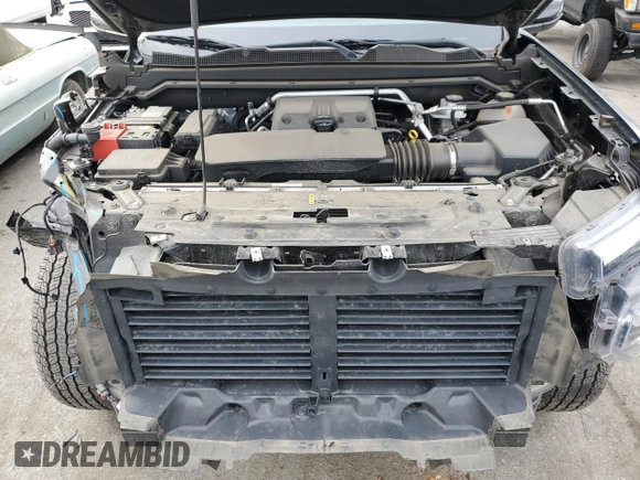 2023 GMC Canyon 2WD Elevation with VIN 1GTP5BEK8P1195517, listed as a Copart auction lot 43479755 with 21,633 mi miles and Salvage Title. Bid and sale history available at DreamBid. Image 11.