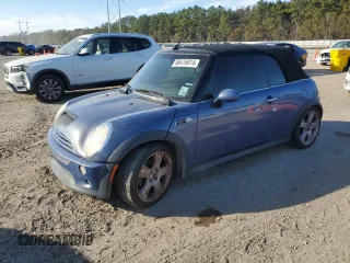 2005 MINI Convertible S with VIN WMWRH33485TF82337, listed as a Copart auction lot 86476974 with 130,286 mi miles and Salvage Title. Bid and sale history available at DreamBid. Image 1.