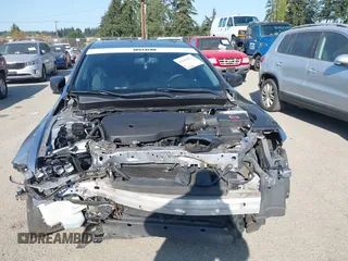 2015 Acura TLX V6 with VIN 19UUB2F32FA025334, listed as a IAAI auction lot 42099075 with 107,409 mi miles. Bid and sale history available at carsss.com. Image 13.