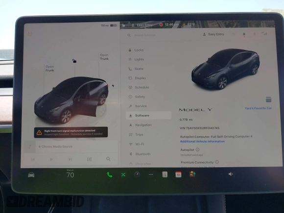 2024 Tesla Model Y with VIN 7SAYGDED2RF040745, listed as a IAAI auction lot 41986613 with 9,778 mi miles and . Bid and sale history available at DreamBid. Image 18.