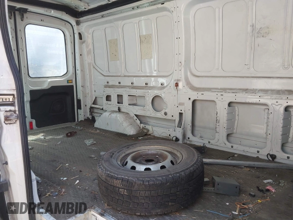 2016 Ford Transit Cargo z VIN 1FTYR2CG4GKA82911, wystawiony jako IAAI lot #41909433 z przebiegiem Nie podano mil oraz . Historia ofert i sprzedaży dostępna na DreamBid. Obrazek 8.