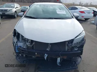 2018 Toyota Corolla L z VIN 5YFBURHE2JP831394, wystawiony jako IAAI lot #41689172 z przebiegiem 74 985 mil mil oraz . Historia ofert i sprzedaży dostępna na DreamBid. Obrazek 6.