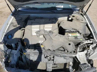 2006 Hyundai Tiburon GT z VIN KMHHN65F76U190851, wystawiony jako Copart lot #45935795 z przebiegiem 102 335 mil mil oraz Szkoda całkowita • Salvage title. Historia ofert i sprzedaży dostępna na DreamBid. Obrazek 12.