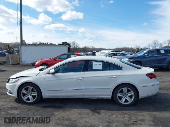 2013 Volkswagen CC Sport with VIN WVWBN7AN9DE516590, listed as a IAAI auction lot 41684586 with 153,312 mi miles. Bid and sale history available at carsss.com. Image 14.