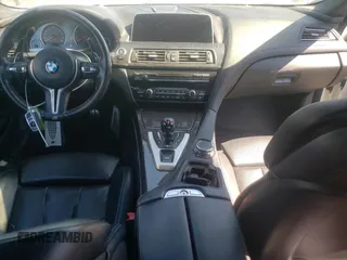 2016 BMW M6 z VIN WBS6J9C56GD934498, wystawiony jako Copart lot #73539754 z przebiegiem 116 944 mil mil oraz Czysty tytuł • Clean title. Historia ofert i sprzedaży dostępna na DreamBid. Obrazek 8.